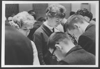 Young scientists at prayer.