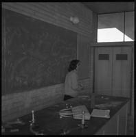 Student in a science classroom.