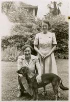 Edith Millican with friend and a dog in China.
