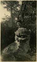 Aimee Millican posing on statue.