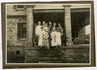 Missionaries, group photo, with Aimee, Frank, and Edith Millican.