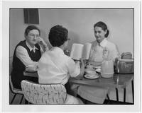 Edith Millican,  Myrtle Scott, and a nurse eating together.