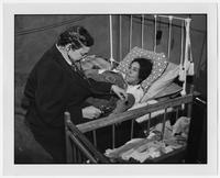 Edith Millican attending to a patient.