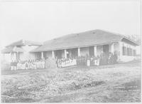 Missionaries and church members in front of Theodore Carter Memorial School, Ratnagiri.