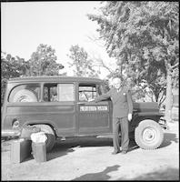 Dr. John C. Smith with Presbyterian Mission vehicle, ca. 1952.