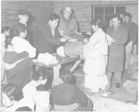 Rev. Archibald Campbell helping with Korean relief.