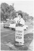 Students hitch-hike to church services.