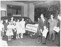 Children give station wagon for church work.