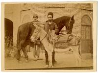 Men with horse and donkey in Hamadān, Iran.