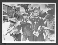 Bishop braves riots in appeal for peace.