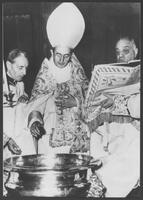 Pope blesses Agnus Dei.