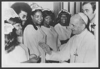 Pope Paul greets gospel singers.