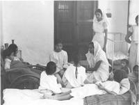 Patients and nurses in hospital.