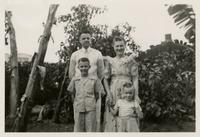 Reverend Eugene Hessel and Elizabeth Wonder Hessel and two children in Philippines.
