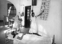 Nurse and patients at Memorial Hospital in Fatehgarh.