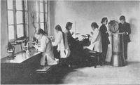 Female students working in laboratory.