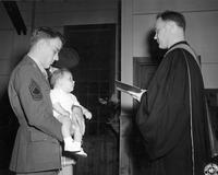 Baptism service for child of Army sergeant.
