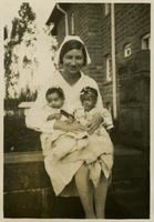 Marjorie Faught with two Ethiopian children.