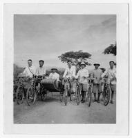Reverend John Scott Holladay and a group on bicycles.