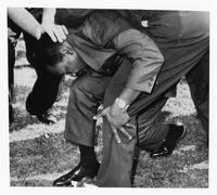Dr. Martin Luther King, Jr. struck by a rock.