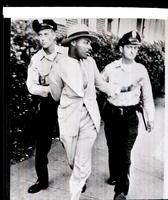 Police arrest Dr. King for loitering.