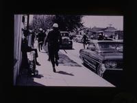 Police chasing men, Watts Rebellion